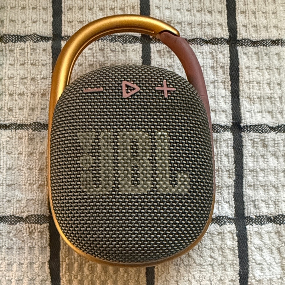 JBL Portable Bluetooth Speaker in Gray with Gold Carabiner